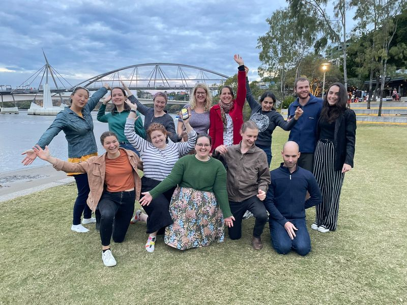 Image of group of researchers from the lab in a park